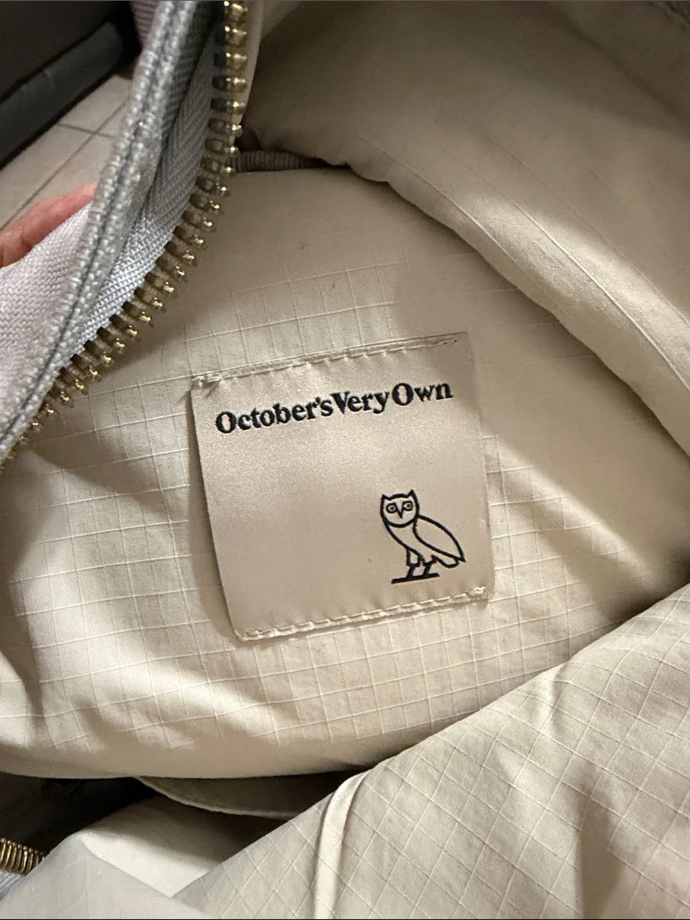 October's Very Own Light Gray Canvas Backpack with Gold Trim